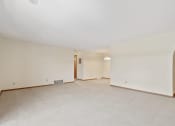 Thumbnail 29 of 33 - apartment living room with white walls and carpet