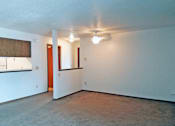 Thumbnail 4 of 8 - A room with a ceiling fan and a window.
