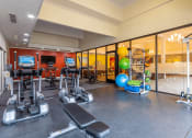Thumbnail 12 of 18 - large fitness center with vaulted ceiling