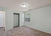 Thumbnail 5 of 27 - apartment bedroom with carpet and closet