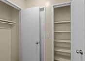 Thumbnail 7 of 27 - a bathroom with closets