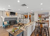 Thumbnail 10 of 27 - clubhouse with a couch and a table