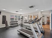 Thumbnail 16 of 27 - fitness center with treadmills and other exercise equipment