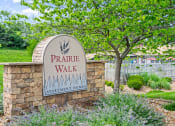 Thumbnail 20 of 27 - a welcome sign for Prairie Walk apartments