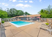 Thumbnail 18 of 27 - apartment building with a pool