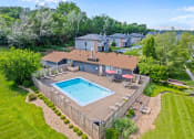 Thumbnail 25 of 27 - an aerial view of a swimming pool in a backyard