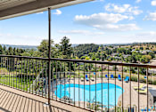 Thumbnail 6 of 11 - A pool with a view of the mountains.
