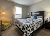 Thumbnail 8 of 29 - our apartments offer a bedroom with a king sized bed