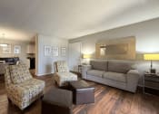 Thumbnail 4 of 29 - a living room with a couch and two chairs