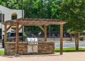 Thumbnail 25 of 29 - outdoor grill at  Quail Hollow Apartments!