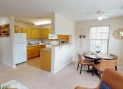 Thumbnail 1 of 35 - A kitchen with white appliances and wooden cabinets.