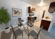 Thumbnail 6 of 22 - a kitchen and dining room with a glass table and chairs