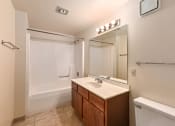 Thumbnail 13 of 35 - Large full bathroom with large mirror
