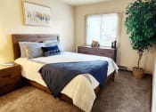 Thumbnail 5 of 35 - a bedroom with a window