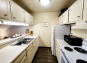 Thumbnail 2 of 35 - Apartment Kitchen with Dishwasher
