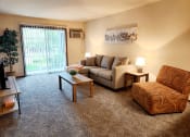 Thumbnail 3 of 35 - living room with a patio