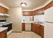 Thumbnail 8 of 35 - kitchen with oven, refrigerator and dishwasher