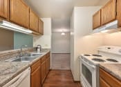 Thumbnail 9 of 35 - spacious galleys style kitchen at river's edge apartments