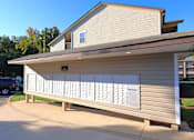 Thumbnail 27 of 32 - The mailbox area at residences at forestdale apartments