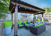 Thumbnail 24 of 32 - a deck with a pergola and patio furniture