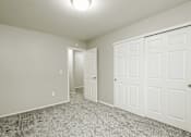 Thumbnail 16 of 31 - A white door is on the right side of the image.