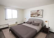 Thumbnail 10 of 22 - a bedroom with a bed
