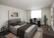 Thumbnail 8 of 22 - a bedroom with a bed and a desk