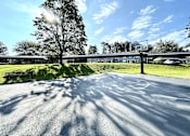 Thumbnail 21 of 29 - basketball court at Rolling Pines Apartments