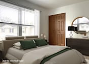 Thumbnail 3 of 29 - A bedroom with a large bed and a wooden door.