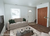 Thumbnail 1 of 29 - A living room with a couch, coffee table, and a door.