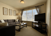 Thumbnail 2 of 30 - Living room with natural light