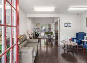 Thumbnail 14 of 23 - clubhouse seating area at saddlecreek apartments