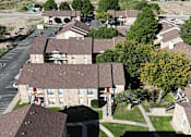 Thumbnail 27 of 30 - A bird's eye view of a residential area with houses and trees.