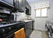 Thumbnail 8 of 22 - apartment with Granite Counter Tops