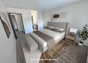Thumbnail 4 of 20 - A bedroom with a bed, nightstand, and mirror.