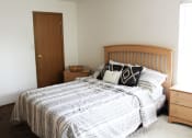 Thumbnail 11 of 35 - primary bedroom with a bed