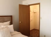 Thumbnail 13 of 35 - a bedroom with a walk in closet