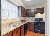 Thumbnail 7 of 25 - kitchen at Summer Green Apartments