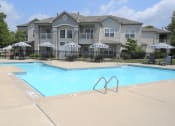Thumbnail 26 of 39 - Swimming pool at Norton Shores apartment complex, shoreline landing