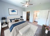 Thumbnail 8 of 39 - Spacious bedroom with connected bath at shoreline landing apartments