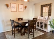 Thumbnail 2 of 10 - apartment dining room with a table and chairs