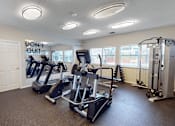 Thumbnail 12 of 29 - A gym with a sign that says, "Don't Quit."