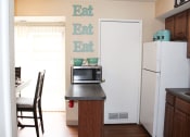 Thumbnail 6 of 31 - a open kitchen with a refrigerator