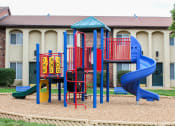 Thumbnail 21 of 31 - playground at apartment community