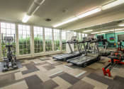 Thumbnail 11 of 17 - the gym at apartment complex
