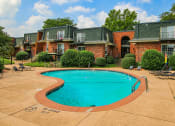 Thumbnail 8 of 17 - a large swimming pool at apartment complex