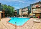 Thumbnail 7 of 17 - a resort style pool at apartment building