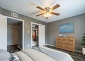 Thumbnail 7 of 26 - large bedroom with wood-style flooring and large closet