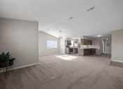 Thumbnail 1 of 33 - the living room and kitchen of an apartment