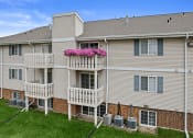 Thumbnail 27 of 28 - an apartment building with Bavarian inspired balconies outside sun valley apartments